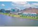 Riverfront cityscape blends commercial buildings, modern apartments, and mountain views at 140 E Rio Salado Pkwy # 402, Tempe, AZ 85281