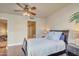 Comfortable bedroom boasts a ceiling fan, hardwood floors, and a calming atmosphere at 140 E Rio Salado Pkwy # 402, Tempe, AZ 85281