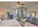 Bright bedroom featuring a dark dresser with outdoor views and natural light at 140 E Rio Salado Pkwy # 402, Tempe, AZ 85281