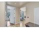 Hallway view leading to a living space with floor to ceiling windows for ample natural light at 140 E Rio Salado Pkwy # 402, Tempe, AZ 85281