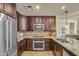 Fully-equipped kitchen with stainless steel appliances and granite countertops at 140 E Rio Salado Pkwy # 402, Tempe, AZ 85281