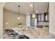 Kitchen island with granite countertop and stainless steel sink at 140 E Rio Salado Pkwy # 402, Tempe, AZ 85281