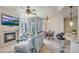 Cozy living room with fireplace, TV, and floor-to-ceiling windows at 140 E Rio Salado Pkwy # 402, Tempe, AZ 85281