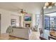 Bright living space featuring a fireplace, modern furniture, and city views at 140 E Rio Salado Pkwy # 402, Tempe, AZ 85281