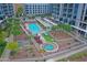 Outdoor community pool and hot tub with a lawn and lounge area provide outdoor enjoyment at 140 E Rio Salado Pkwy # 402, Tempe, AZ 85281