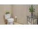 Well-appointed powder room featuring a decorative side table and plant at 140 E Rio Salado Pkwy # 402, Tempe, AZ 85281