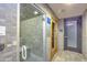 Relax in this modern steam room with seating, a glass door and tiled walls at 140 E Rio Salado Pkwy # 402, Tempe, AZ 85281