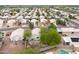 Neighborhood aerial view with tidy backyards, green landscaping and a community feel at 15715 W Cottonwood St, Surprise, AZ 85374