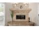 Close up of a beautiful fireplace with granite hearth and built in lighting at 1625 E Monte Cristo Ave, Phoenix, AZ 85022