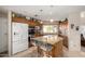 Spacious kitchen with granite counters, stainless appliances, and tiled floors at 1625 E Monte Cristo Ave, Phoenix, AZ 85022