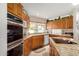 Well appointed kitchen featuring granite counters, stainless appliances, and under cabinet lighting at 1625 E Monte Cristo Ave, Phoenix, AZ 85022