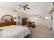 Large main bedroom with vaulted ceilings, sitting area, and en suite bathroom access at 1625 E Monte Cristo Ave, Phoenix, AZ 85022