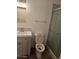 A full bathroom with a single vanity, toilet, and enclosed shower at 1630 E Catalina Dr, Phoenix, AZ 85016
