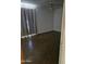 A basic bedroom featuring a ceiling fan, window with curtains, and sparse furnishings at 1630 E Catalina Dr, Phoenix, AZ 85016