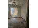 A bedroom with a window and basic features, awaiting personalization at 1630 E Catalina Dr, Phoenix, AZ 85016