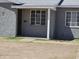 Up close look at the front exterior of the home with a security door and view of the house number at 1630 E Catalina Dr, Phoenix, AZ 85016