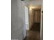 Hallway with access to other rooms and closet space at 1630 E Catalina Dr, Phoenix, AZ 85016