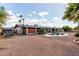 Expansive backyard with desert landscaping and an inviting pool for relaxation and entertainment at 1650 E Gary St, Mesa, AZ 85203