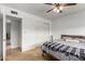 Bedroom featuring a comfortable bed and a sliding door closet at 1650 E Gary St, Mesa, AZ 85203