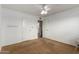 Bright bedroom features a glimpse into the adjacent bathroom at 1650 E Gary St, Mesa, AZ 85203