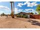 Side view of a charming single-story residence featuring desert landscaping at 1650 E Gary St, Mesa, AZ 85203