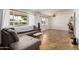 Inviting living room filled with natural light, features a comfortable gray sectional couch at 1650 E Gary St, Mesa, AZ 85203