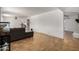 Bright and airy living room featuring tile flooring and a comfortable gray sofa at 1650 E Gary St, Mesa, AZ 85203