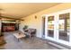 Covered patio featuring hot tub and outdoor seating area at 1650 E Gary St, Mesa, AZ 85203
