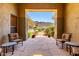 Cozy courtyard provides a serene outdoor retreat with comfortable seating and views of the desert landscape at 16562 N 109Th Way, Scottsdale, AZ 85255