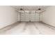 A bright and spacious garage featuring two-car garage doors at 16562 N 109Th Way, Scottsdale, AZ 85255