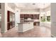 Spacious kitchen with stainless steel appliances and a center island at 16562 N 109Th Way, Scottsdale, AZ 85255