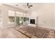 Bright living room with fireplace and large windows at 16562 N 109Th Way, Scottsdale, AZ 85255