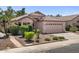 Charming single-story home featuring desert landscaping and a cozy, inviting exterior at 1761 E Countrywalk Ln, Chandler, AZ 85225