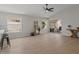 Open-concept living space featuring modern flooring and abundant natural light at 1761 E Countrywalk Ln, Chandler, AZ 85225