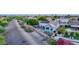 Aerial view of the backyard with patio, pool, and greenery creating a tranquil outdoor space at 18161 N 63Rd Ln, Glendale, AZ 85308