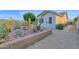 Desert landscaping in the backyard with cacti and rocks at 18161 N 63Rd Ln, Glendale, AZ 85308