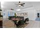 This open living room has modern neutral decor and an area rug at 18161 N 63Rd Ln, Glendale, AZ 85308