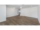 Spacious living room features wood-look floors and neutral paint, ready for personalized décor at 1820 W Seldon Way, Phoenix, AZ 85021