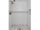 Walk-in shower with white subway tile, mosaic accents, and a shower head at 1820 W Seldon Way, Phoenix, AZ 85021