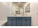 Bathroom with double sink vanity, large mirror, and modern fixtures at 18250 N Cave Creek Rd # 139, Phoenix, AZ 85032