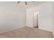Cozy bedroom with neutral carpet, closet, and plenty of natural light at 18250 N Cave Creek Rd # 139, Phoenix, AZ 85032