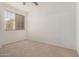 Bedroom featuring neutral carpet and a window at 18250 N Cave Creek Rd # 139, Phoenix, AZ 85032