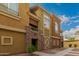 Inviting townhome exterior with brick accents and low-maintenance desert landscaping at 18250 N Cave Creek Rd # 139, Phoenix, AZ 85032