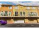 Townhome complex featuring multiple units, each with attached garage and unique facade at 18250 N Cave Creek Rd # 139, Phoenix, AZ 85032