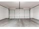 Spacious two car garage with smooth, sealed flooring is ideal for a workshop or storage at 18250 N Cave Creek Rd # 139, Phoenix, AZ 85032