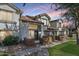 Charming townhome featuring a secure gated front porch and desert landscaping at 2201 N Comanche Dr # 1094, Chandler, AZ 85224