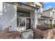Charming home exterior with a well-maintained front yard, brick accents, and secure entry gate at 2201 N Comanche Dr # 1094, Chandler, AZ 85224