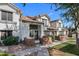 Charming townhome with a well-maintained yard, inviting entrance, and classic desert landscaping at 2201 N Comanche Dr # 1094, Chandler, AZ 85224