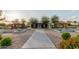 Community garden featuring plots, gravel paths, and covered seating areas at 22858 E Silver Creek Ln, Queen Creek, AZ 85142