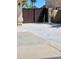 View of the tall, dark brown, wood-paneled gate to the side yard at 23833 N 39Th N Ln, Glendale, AZ 85310